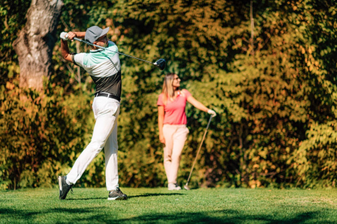 Golfers golfing in South East Calgary golf course