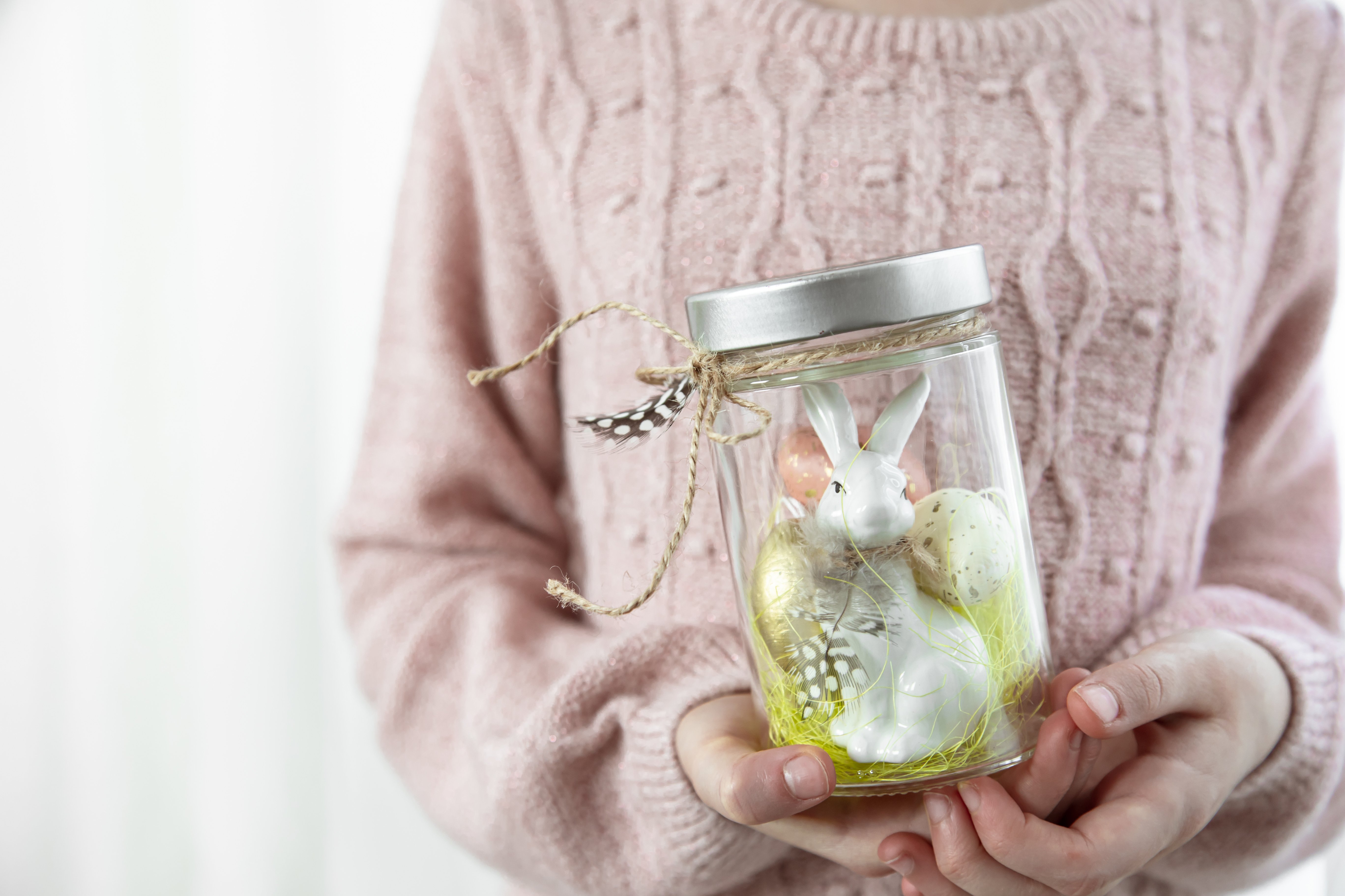 easter-background-with-jar-with-festive-decor-childrens-hands